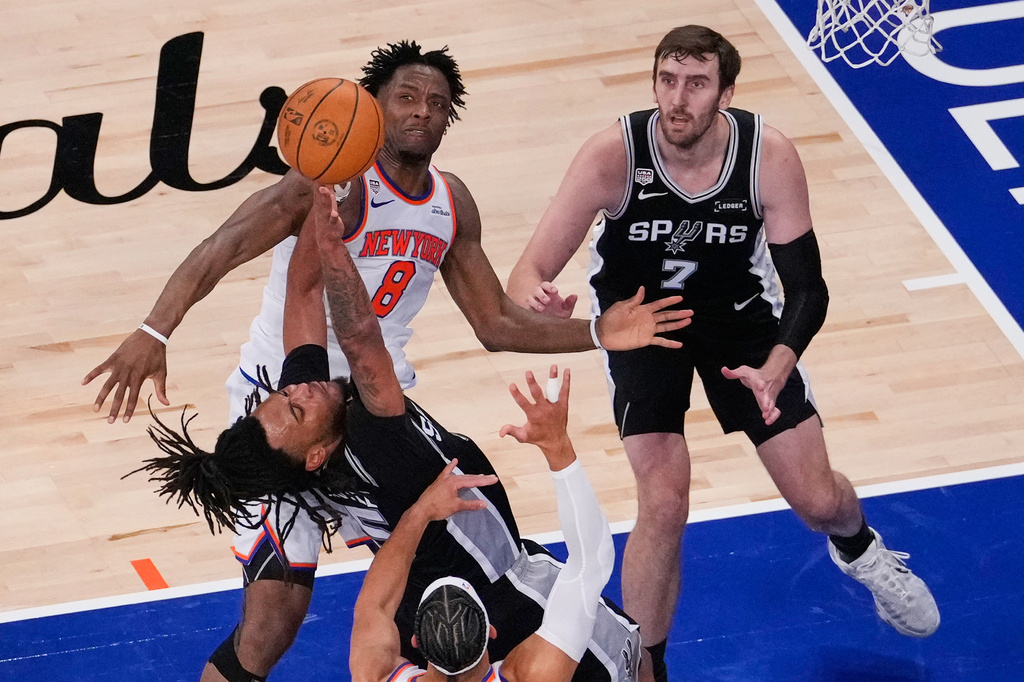 San Antonio Spurs guard Stephon Castle (5) tries to get a shot off during Game 3 of the NBA Finals basketball series against the New York Knicks, Monday, June 8, 2026, in New York. (AP Photo/Yuki Iwamura)