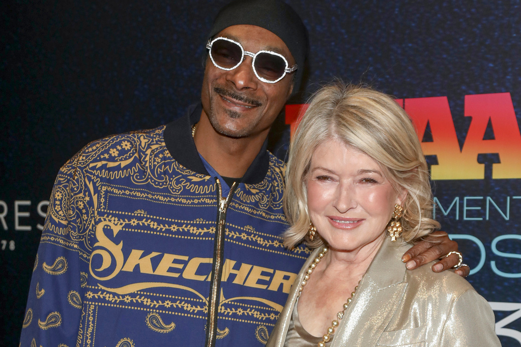 FILE - Snoop Dogg, left, and Martha Stewart attend the Footwear News Achievement Awards at Cipriani South Street on Wednesday, Nov. 29, 2023, in New York. (Photo by Andy Kropa/Invision/AP, File)