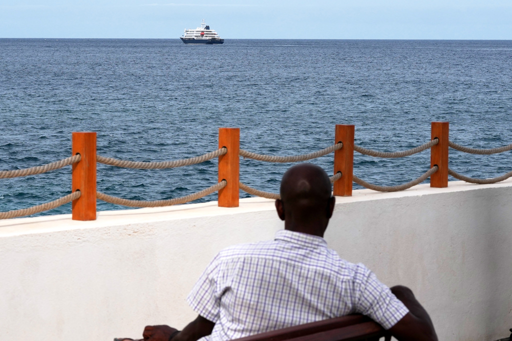 The MV Hondius cruise ship departs the port in Praia, Cape Verde, Wednesday, May 6, 2026. (AP Photo/Misper Apawu)
