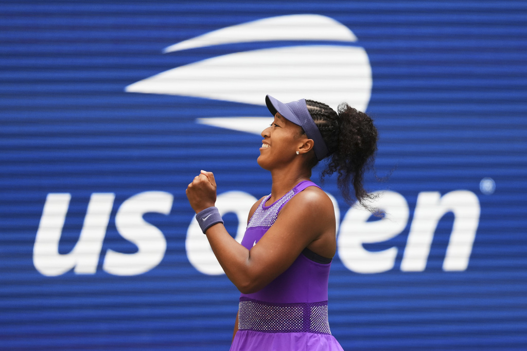 Naomi Osaka, of Japan, celebrates after winning a match against Coco Gauff, of the United States, during the fourth round of the US Open tennis championships, Monday, Sept. 1, 2025, in New York. (AP Photo/Kirsty Wigglesworth)