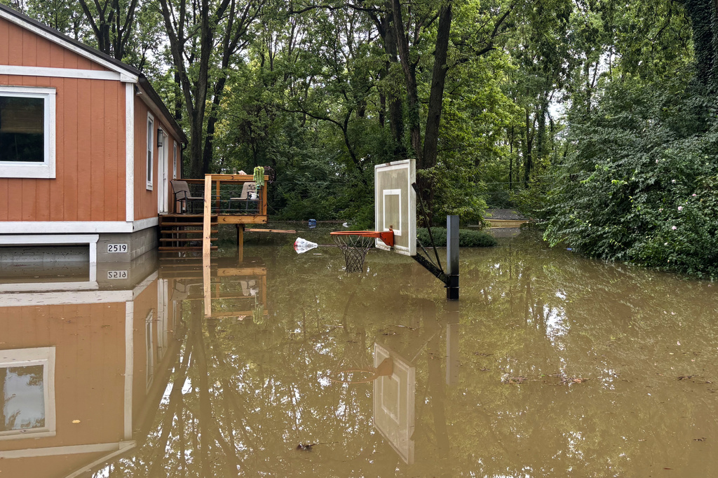 This photo provided by the Indianapolis Fire Department shows flooding in northern Indianapolis, Ind., Saturday, Aug. 15, 2026. (Indianapolis Fire Department via AP)