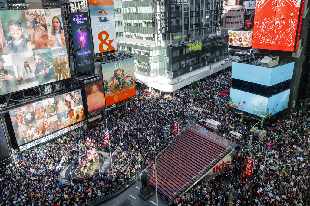 FILE - Thousands of protesters fill Times Square during a "No Kings" protest in New York, Oct. 18, 2025. (AP Photo/Olga Fedorova, File)