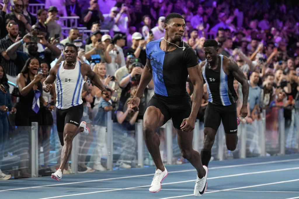 Fred Kerley, of the United States, wins the men's 100-meter final at the Enhanced Games in Las Vegas, Sunday, May 24, 2026. (AP Photo/Jae C. Hong)