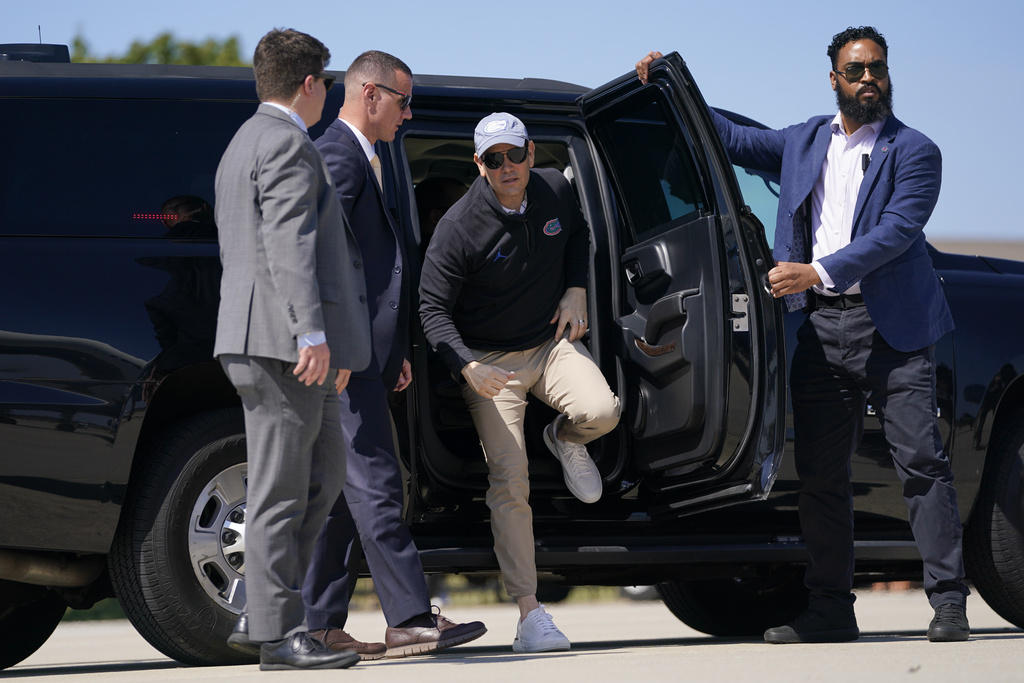 Secretary of State Marco Rubio arrives in a vehicle before departing for Israel at Joint Base Andrews, Md., Saturday, Sept. 13, 2025. (Nathan Howard/Pool Photo via AP)