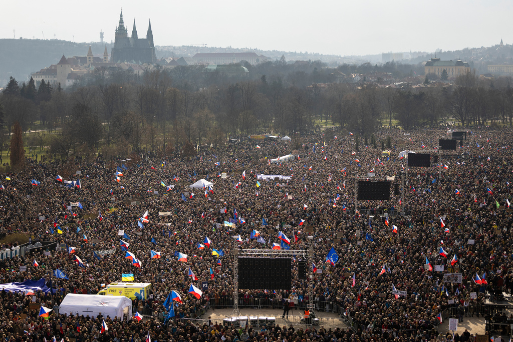 People gather to take part in a large anti-government protest in Prague, Czech Republic, Saturday, March 21, 2026. (AP Photo/Michal Turek)