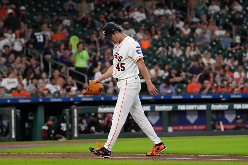 Houston Astros starting pitcher Tatsuya Imai walks toward the dugout after being pulled during the second inning of a baseball game against the Minnesota Twins Wednesday, July 1, 2026, in Houston. (AP Photo/David J. Phillip)
