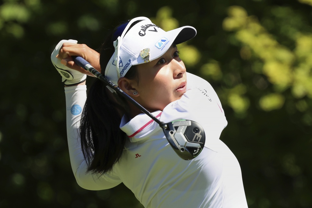 Jeeno Thitikul, of Thailand, tees off on the first hole during the final round of the FM Championship LPGA golf tournament at TPC Boston, Sunday, Aug. 31, 2025, in Norton, Mass. (AP Photo/Michael Dwyer)