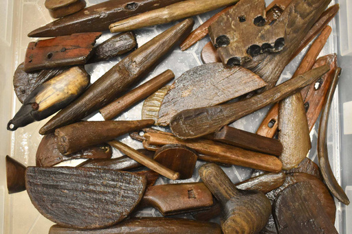 This photo provided by Richard Arden Knecht shows various tools, utensils and other artifacts that were recovered after the Typhoon Halong scattered them from a significant Yup'ik archaeological site, known as the Nunalleq site, in Quinhagak, Alaska, Oct. 2025. (Richard Arden Knecht via AP) This photo provided by Richard Arden Knecht shows various tools, utensils and other artifacts that were recovered after the Typhoon Halong scattered them from a significant Yup'ik archaeological site, known as the Nunalleq site, in Quinhagak, Alaska, Oct. 2025. (Richard Arden Knecht via AP)