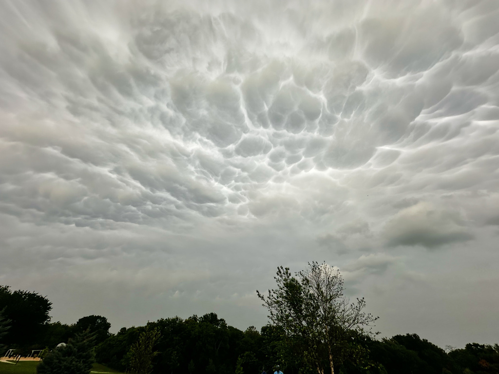 Storm clouds form over a public park as thunderstorms approaches the region, Saturday, April 25, 2026, in Plano, Texas. (AP Photo/Tony Gutierrez)