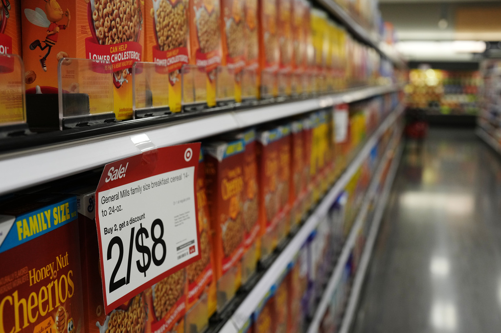 The cereal aisle is seen at a Target store, Thursday, Aug. 13, 2026, in Woodbury, Minn. (AP Photo/Ellen Schmidt)