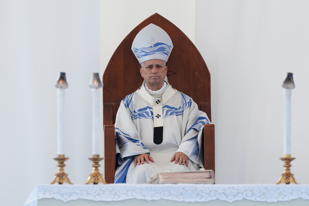 Pope Leo XIV celebrates Mass in Lampedusa, Sicily, southern Italy, Saturday, July 4, 2026, during a one-day pastoral visit to the Sicilian island that has come to symbolize the dramatic odyssey of migrants trying to reach Europe by sea. (AP Photo/Alessandra Tarantino)