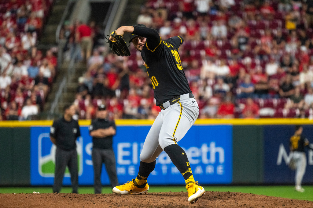 Pittsburgh Pirates pitcher Paul Skenes delivers in the fourth inning of a baseball game against the Cincinnati Reds, Wednesday, Sept. 24, 2025, in Cincinnati. (AP Photo/Michael Swensen)