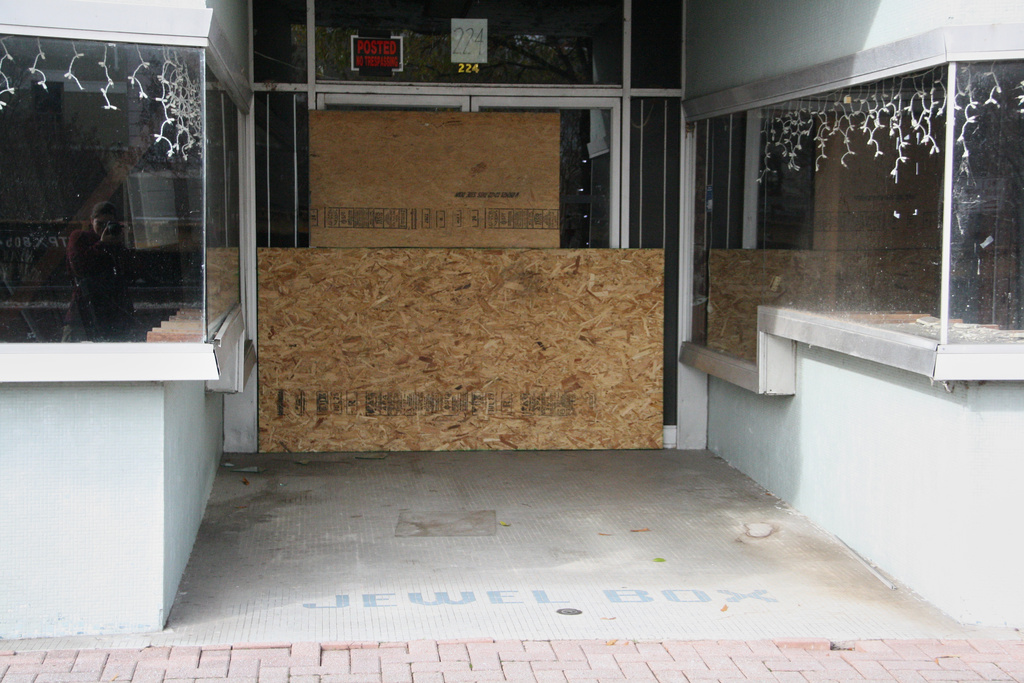 One of many empty storefronts is boarded up along a street in downtown Rocky Mount, N.C., Thursday, Dec. 18, 2025. (AP Photo/Makiya Seminera)