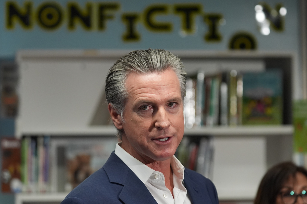 California Gov. Gavin Newsom speaks before signing legislation related to student literacy in Los Angeles on Thursday, Oct. 9, 2025. (AP Photo/Damian Dovarganes)