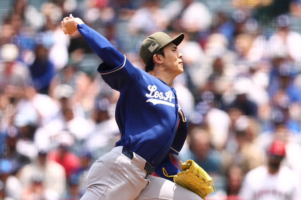 Los Angeles Dodgers pitcher Roki Sasaki throws to a Los Angeles Angels batter during the first inning of a baseball game, Sunday, May 17, 2026, in Anaheim, Calif. (AP Photo/Jessie Alcheh)