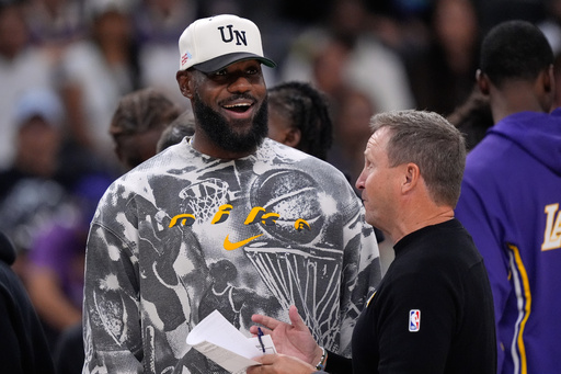 Los Angeles Lakers forward LeBron James, left, talks with assistant coach Scott Brooks during the second half of an NBA preseason basketball game against the Phoenix Suns, Friday, Oct. 3, 2025, in Palm Desert, Calif. (AP Photo/Mark J. Terrill) Los Angeles Lakers forward LeBron James, left, talks with assistant coach Scott Brooks during the second half of an NBA preseason basketball game against the Phoenix Suns, Friday, Oct. 3, 2025, in Palm Desert, Calif. (AP Photo/Mark J. Terrill)