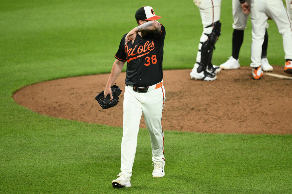 Baltimore Orioles pitcher Kyle Bradish walks back to the dugout after he was pulled during the sixth inning of a baseball game against the New York Yankees, Thursday, Aug. 20, 2026, in Baltimore. (AP Photo/Nick Wass)