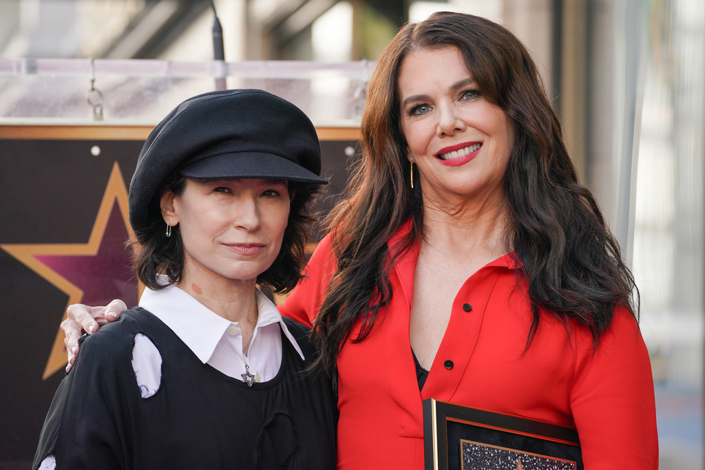 FILE - Amy Sherman-Palladino, left, and Lauren Graham pose with Graham's new star during a ceremony on the Hollywood Walk of Fame, Friday, Oct. 3, 2025, in Los Angeles. (Photo by Jordan Strauss/Invision/AP, File)