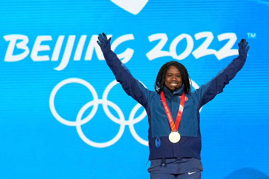 FILE - Gold Medalist Erin Jackson of the United States celebrates during the medal ceremony for the speedskating women's 500-meter race at the 2022 Winter Olympics, Monday, Feb. 14, 2022, in Beijing. (AP Photo/Sue Ogrocki, file)