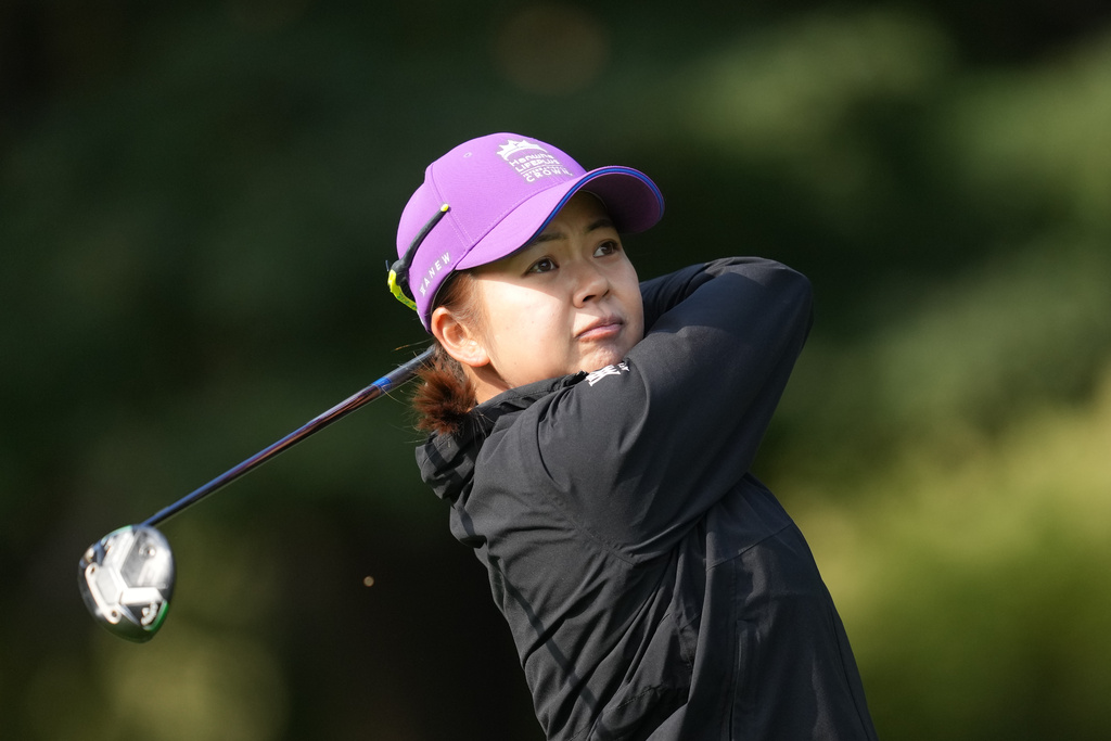 Wei-Ling Hsu of World Team tees off on the fourth hole during the pool B match against Sweden team for the LPGA International Crown golf tournament at the New Korea Country Club in Goyang, South Korea, Saturday, Oct. 25, 2025. (AP Photo/Lee Jin-man)