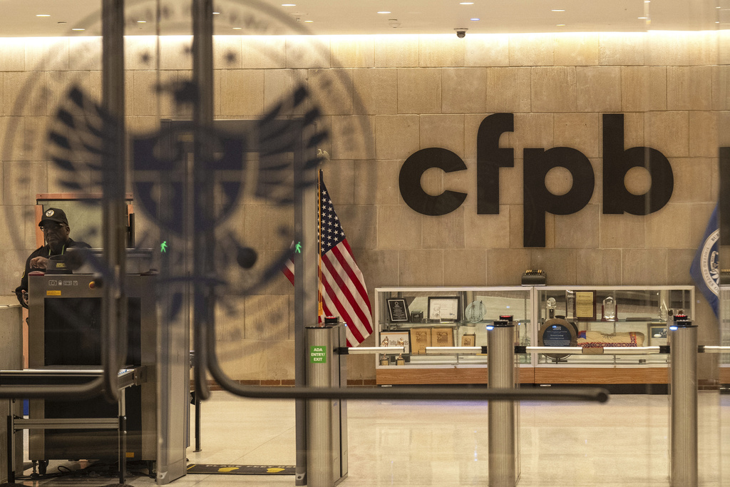 FILE - A security officer works inside of the Consumer Financial Protection Bureau (CFPB) building headquarters Monday, Feb. 10, 2025, in Washington. (AP Photo/Jacquelyn Martin, File)