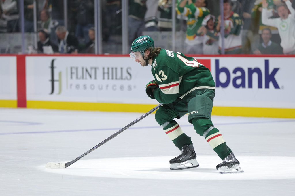 Minnesota Wild defenseman Quinn Hughes (43) skates to the bench after scoring during the third period of Game 6 in the first round of the NHL hockey Stanley Cup playoff series against the Dallas Stars, Thursday, April 30, 2026, in St. Paul, Minn. (AP Photo/Bailey Hillesheim)