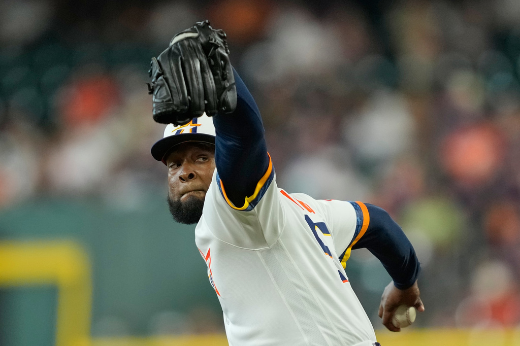 Houston Astros starting pitcher Cristian Javier throws against the Toronto Blue Jays during the first inning of a baseball game Monday, Aug. 3, 2026, in Houston. (AP Photo/David J. Phillip)