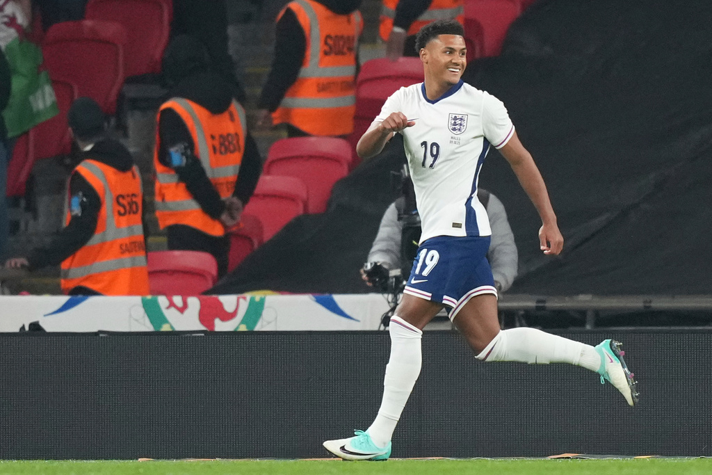 England's Ollie Watkins celebrates after scoring his side's second goal during an international friendly soccer match between England and Wales at Wembley stadium in London, Thursday, Oct. 9, 2025. (AP Photo/Frank Augstein)