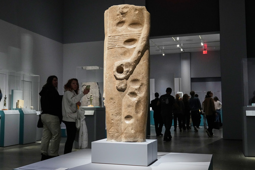 The colossal statue of Min is displayed in the Divine Egypt exhibition, at the Metropolitan Museum of Art, in New York, Tuesday, Oct. 14, 2025. (AP Photo/Richard Drew) The colossal statue of Min is displayed in the Divine Egypt exhibition, at the Metropolitan Museum of Art, in New York, Tuesday, Oct. 14, 2025. (AP Photo/Richard Drew)