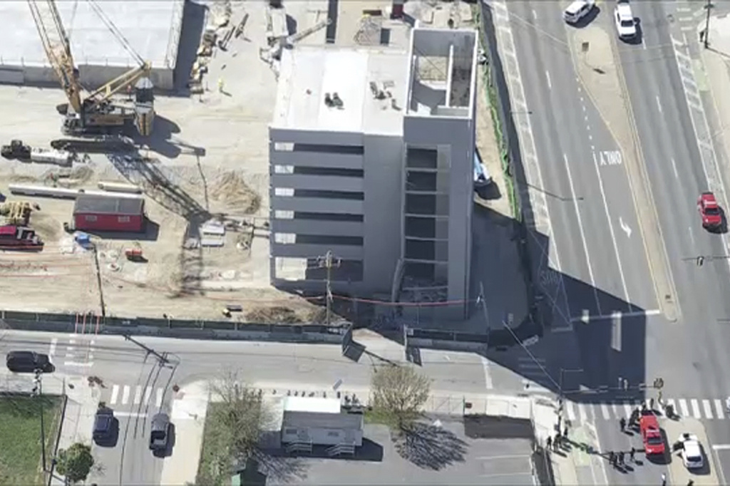 Damage is seen to a parking garage under construction after it collapsed on Wednesday, April 8, 2026, in Philadelphia. (WPVI-TV/6ABC via AP)