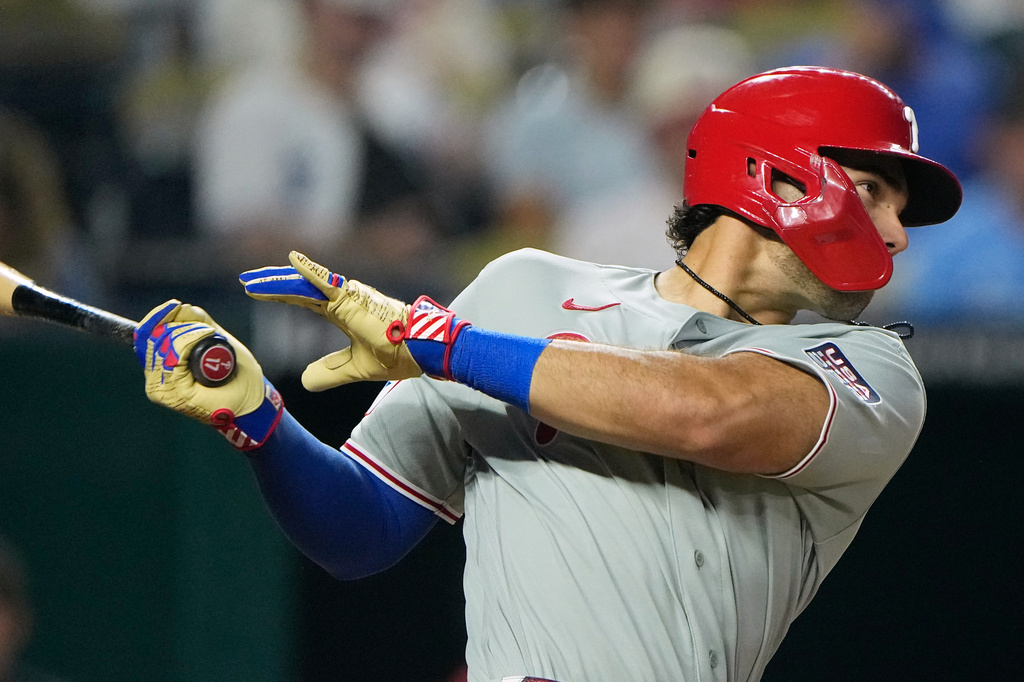 Philadelphia Phillies' Gabriel Rincones Jr. watches his RBI double during the eighth inning of a baseball game against the Kansas City Royals, Saturday, July 4, 2026, in Kansas City, Mo. (AP Photo/Charlie Riedel)