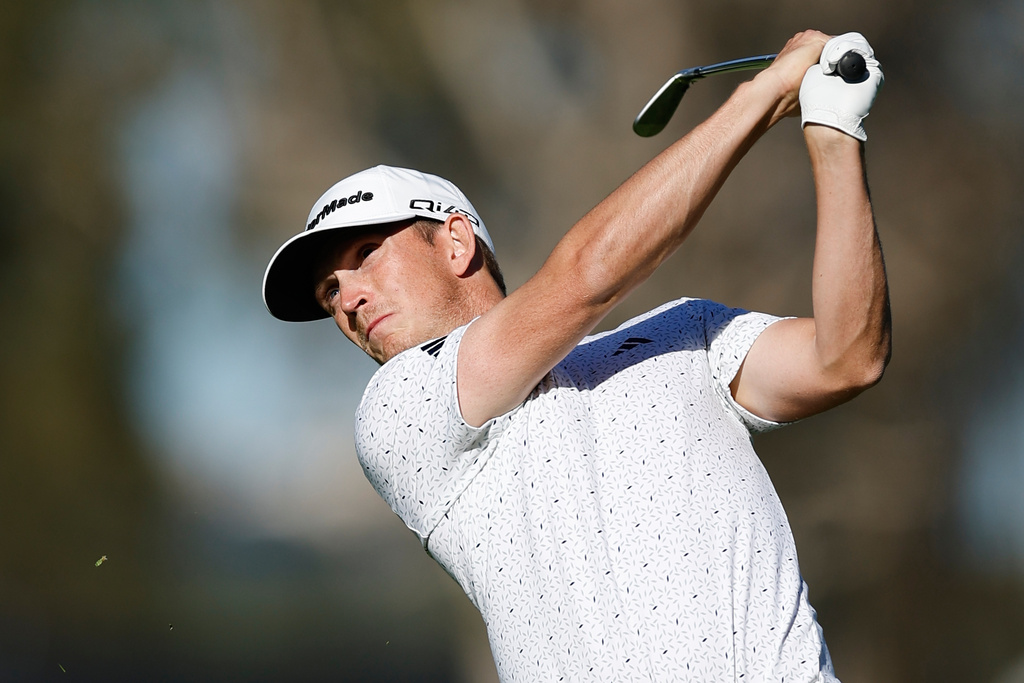 Jacob Bridgeman hits from the 15th fairway during the third round of the Genesis Invitational golf tournament at Riviera Country Club, Saturday, Feb. 21, 2026, in the Pacific Palisades area of Los Angeles. (AP Photo/Caroline Brehman )
