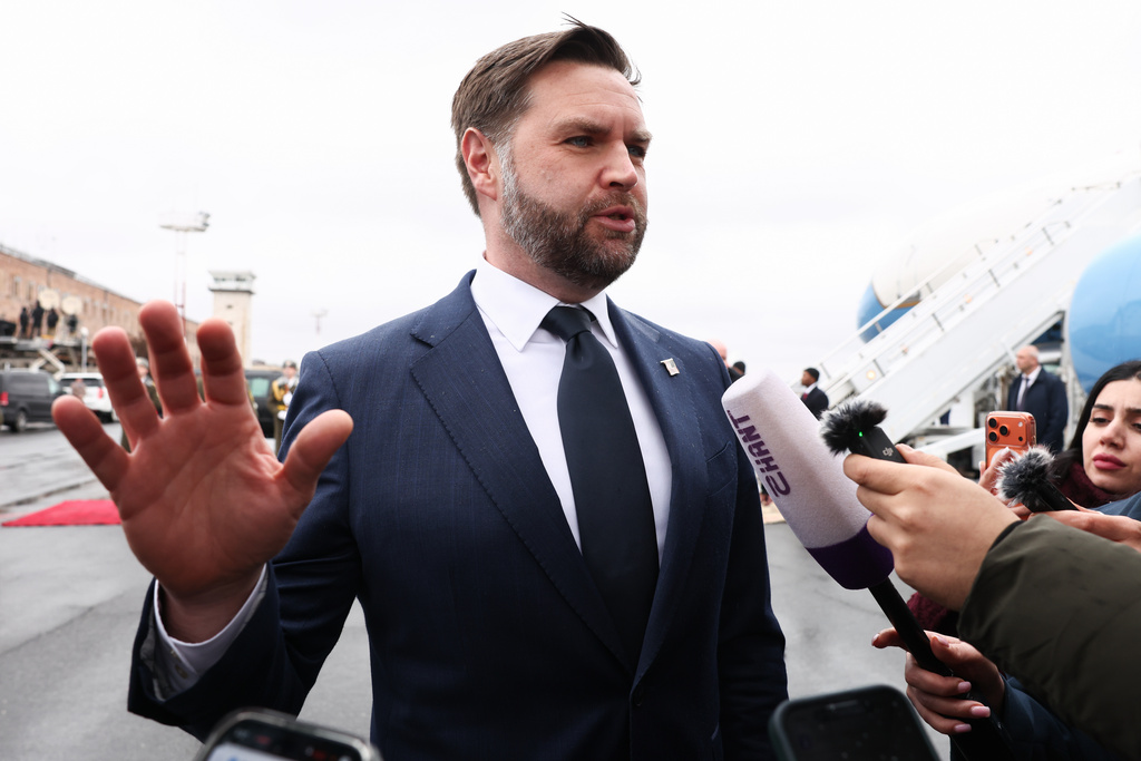 U.S. Vice President J.D. Vance speaks to the media before boarding Air Force Two upon departure for Azerbaijan, at Zvartnots International Airport in Yerevan, Armenia, Tuesday Feb. 10, 2026. (Kevin Lamarque/Pool Photo via AP)