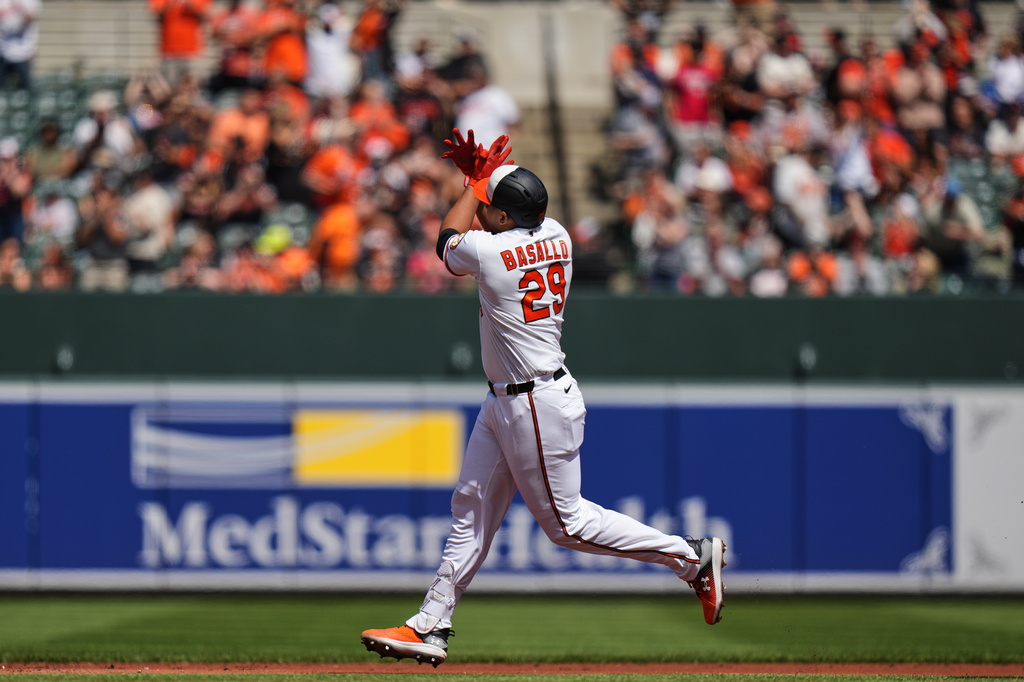 Baltimore Orioles' Samuel Basallo rounds the bases after hitting a two-run home run during the first inning of a baseball game against the San Francisco Giants, Sunday, April 12, 2026, in Baltimore. (AP Photo/Stephanie Scarbrough)