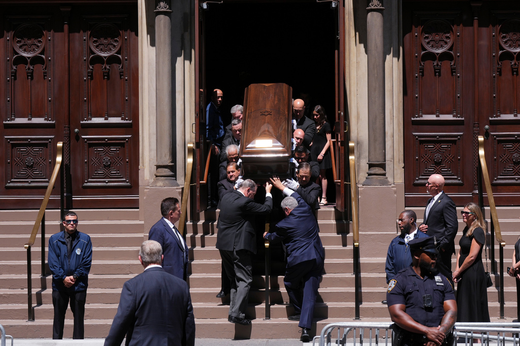 Pallbearers carry the casket after funeral services for Clive Davis at Central Synagogue in New York, Monday, June 29, 2026. (AP Photo/Adam Gray)