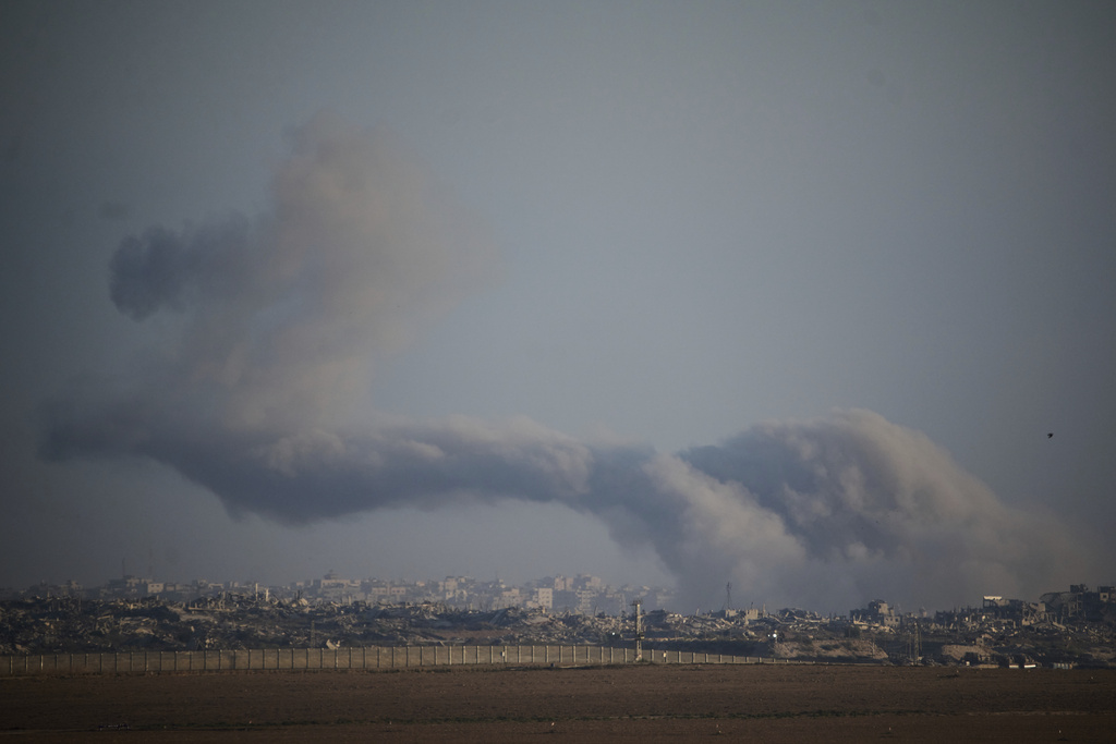 Smoke rises to the sky following an Israeli military strike in the Gaza Strip, as seen from southern Israel, Thursday, Sept. 11, 2025. (AP Photo/Leo Correa)