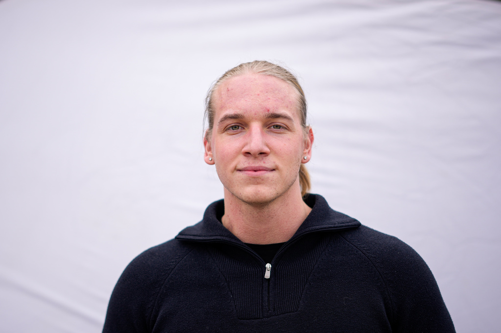 Patrik Gal, 23, poses for a portrait in Budapest, Hungary, Monday, April 13, 2026. "It's about getting a fresh start and seeing what it could bring for us." (AP Photo/Petr David Josek)