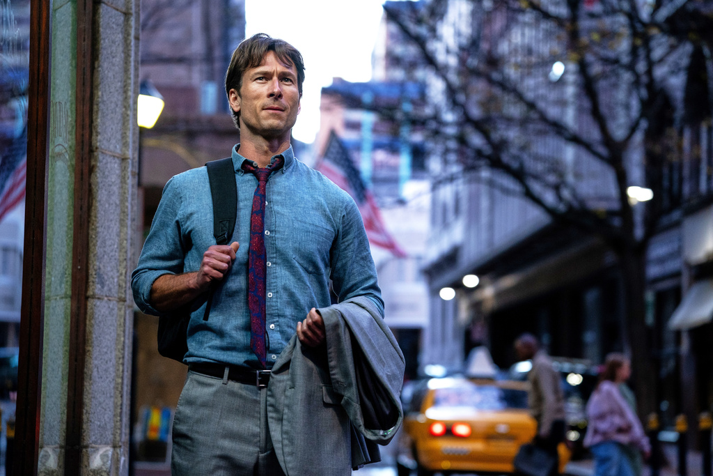 This image released by A24 shows Glen Powell in a scene from "How to Make a Killing." (Ilze Kitshoff/A24 via AP)