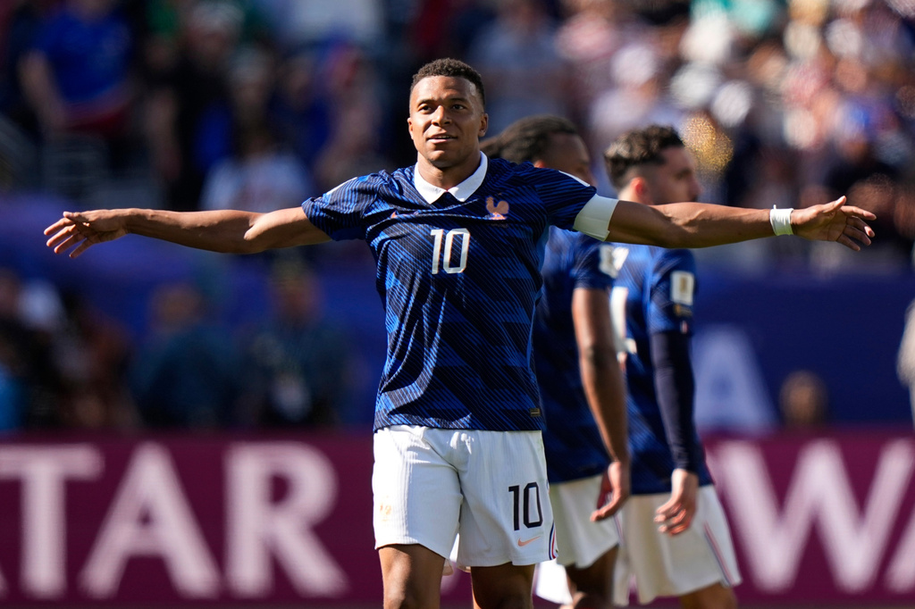 France's Kylian Mbappe celebrates after scoring his side's third goal during the World Cup Group I soccer match between France and Senegal in East Rutherford, N.J., near New York, Tuesday, June 16, 2026. (AP Photo/Frank Franklin II)