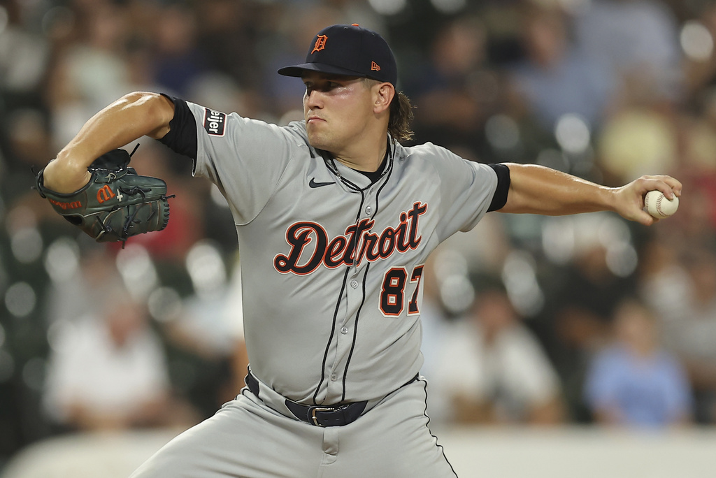 Detroit Tigers pitcher Tyler Holton throws during the seventh inning of a baseball game against the Chicago White Sox, Monday, Aug. 11, 2025, in Chicago. (AP Photo/Melissa Tamez)