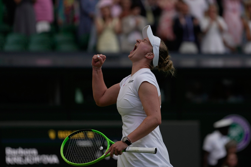Barbora Krejcikova of Czech Republic celebrates her victory against Mirra Andreeva of Russia in their second round women's singles match at the Wimbledon Tennis Championships in London, Wednesday, July 1, 2026. (AP Photo/Brian Inganga)