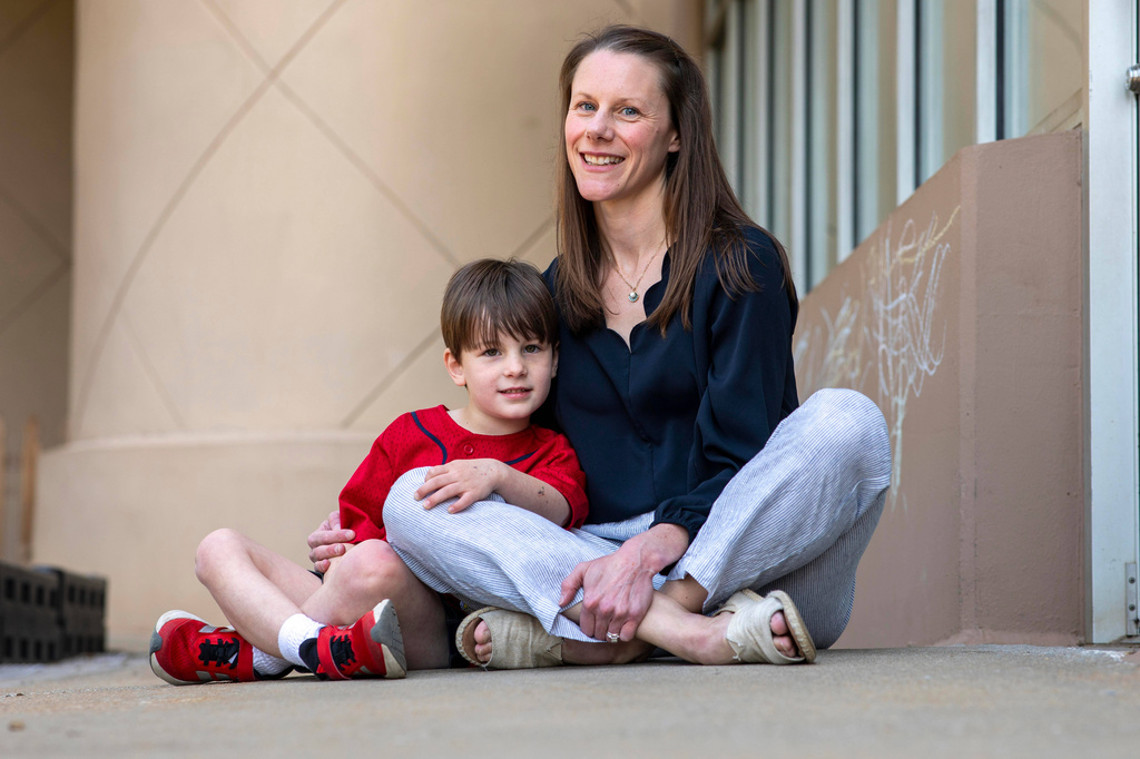 Rebecca Ellis and her son, John Patrick Ellis, 5, pose for a portrait at The Capitol Hill Child Enrichment Center, Wednesday, April 22, 2026, in Atlanta. (AP Photo/Alyssa Pointer)