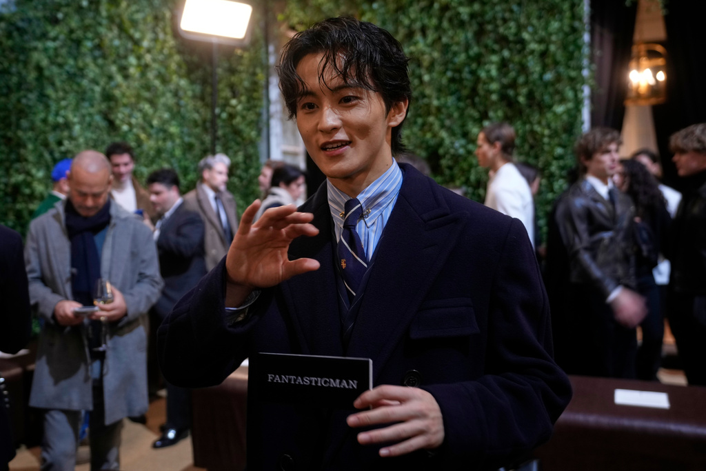 Canadian rapper Mark Lee attends a Ralph Laurent Fall/Winter 2026-2027 Men's fashion show presented in Milan, Italy, Friday, Jan. 16, 2026. (AP Photo/Luca Bruno)