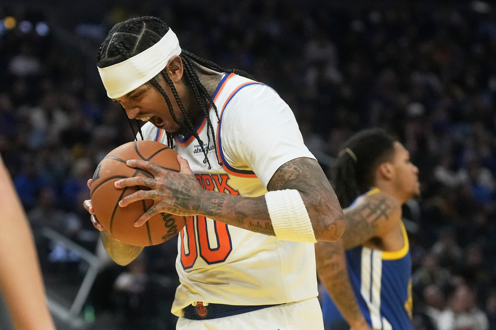 New York Knicks guard Jordan Clarkson reacts after scoring and drawing a foul during the first half of an NBA basketball game against the Golden State Warriors in San Francisco, Thursday, Jan. 15, 2026. (AP Photo/Jeff Chiu)