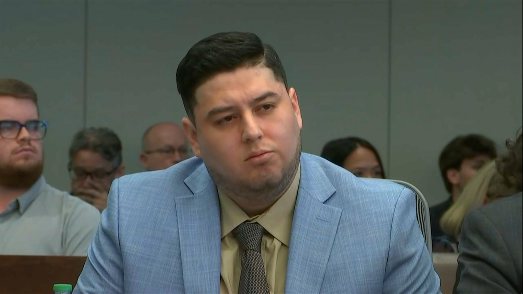 In this frame grab from video, Miguel Salguero Olivares, who is on trial for the murder and rape of University of North Carolina student Faith Hedgepeth, listens to the prosecution's opening argument at a courthouse in Durham, N.C., on Wednesday, Oct. 7, 2026. (Network Pool/via AP)