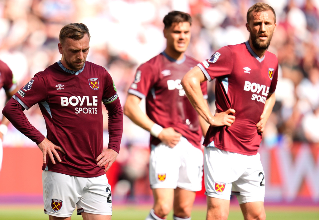West Ham United's Jarrod Bowen, left, looks down towards the ground during the Premier League match between West Ham and Leeds United, in London, Sunday May 24, 2026. (Nick Potts/PA via AP)