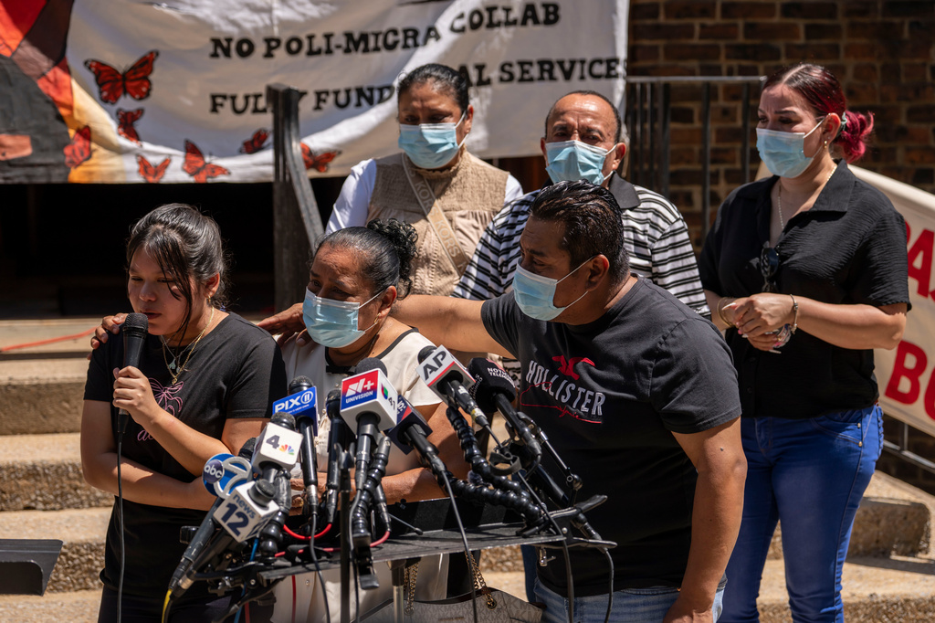 Family members including Ashley, left, daughter of Edwin Lopez-Cornejo, speak during a news conference, Tuesday, Aug. 4, 2026, in Highland Park, N.J. (AP Photo/Yuki Iwamura)