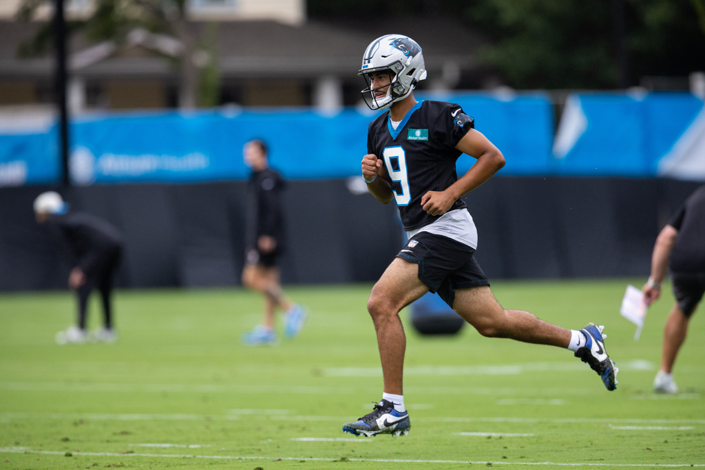 Carolina Panthers quarterback Bryce Young (9) runs during the NFL football team's training camp Thursday, July 23, 2026, in Charlotte, N.C. (AP Photo/Scott Kinser)