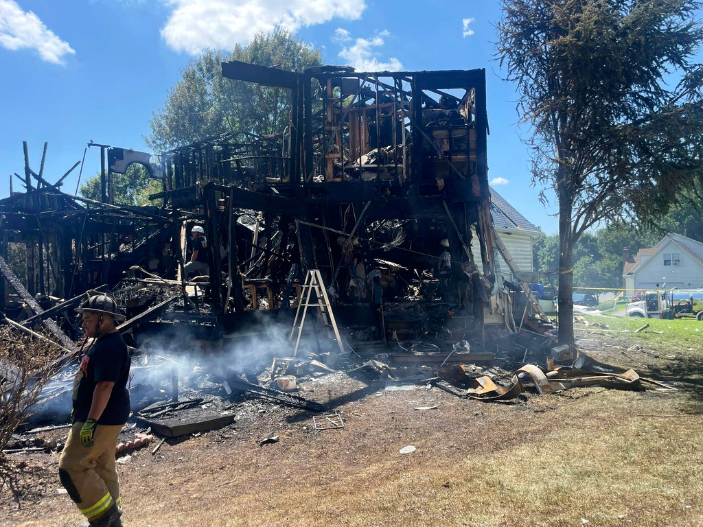 This photo provided by the Office of the State Fire Marshal shows a house fire in Waldorf, Md., Sunday, Aug. 10, 2025. (Office of the State Fire Marshal via AP)