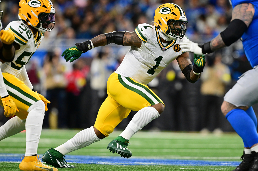 FILE - Green Bay Packers defensive end Micah Parsons rushes the quarterback during the first half of an NFL football game against the Detroit Lions in Detroit, Nov. 27, 2025. (AP Photo/David Dermer, File)